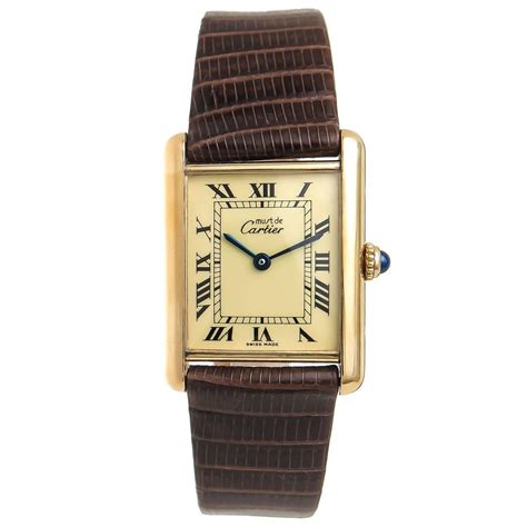 must cartier tank vermeil with diamon